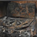 Image of Honda vehicle severely burned.